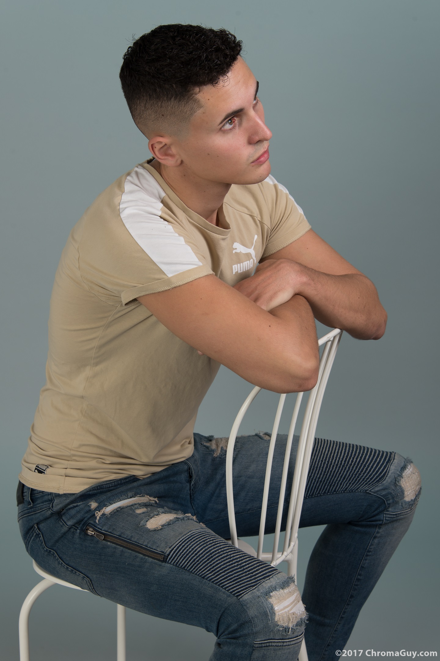 Guy sitting in blue jeans