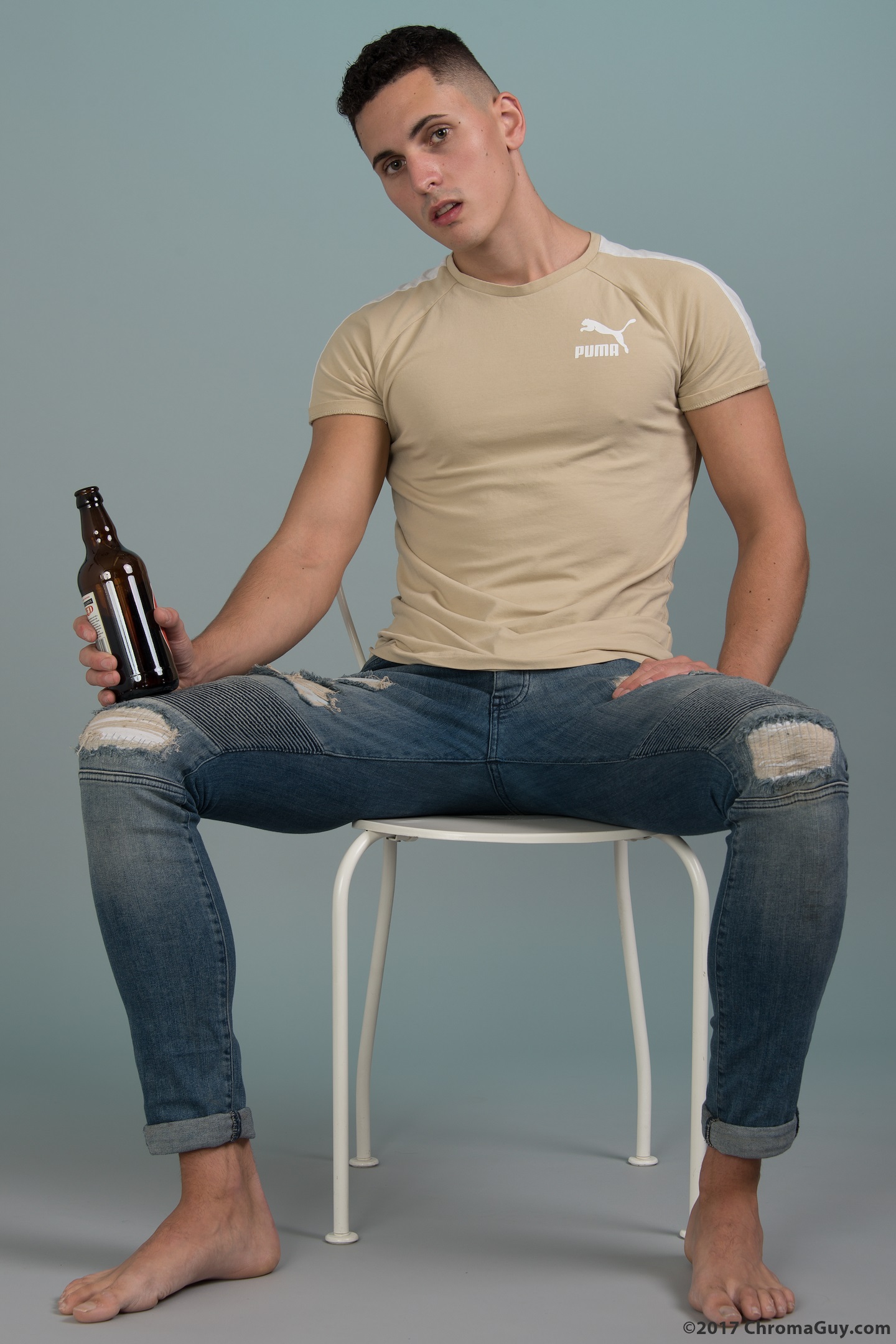 Guy sitting in jeans