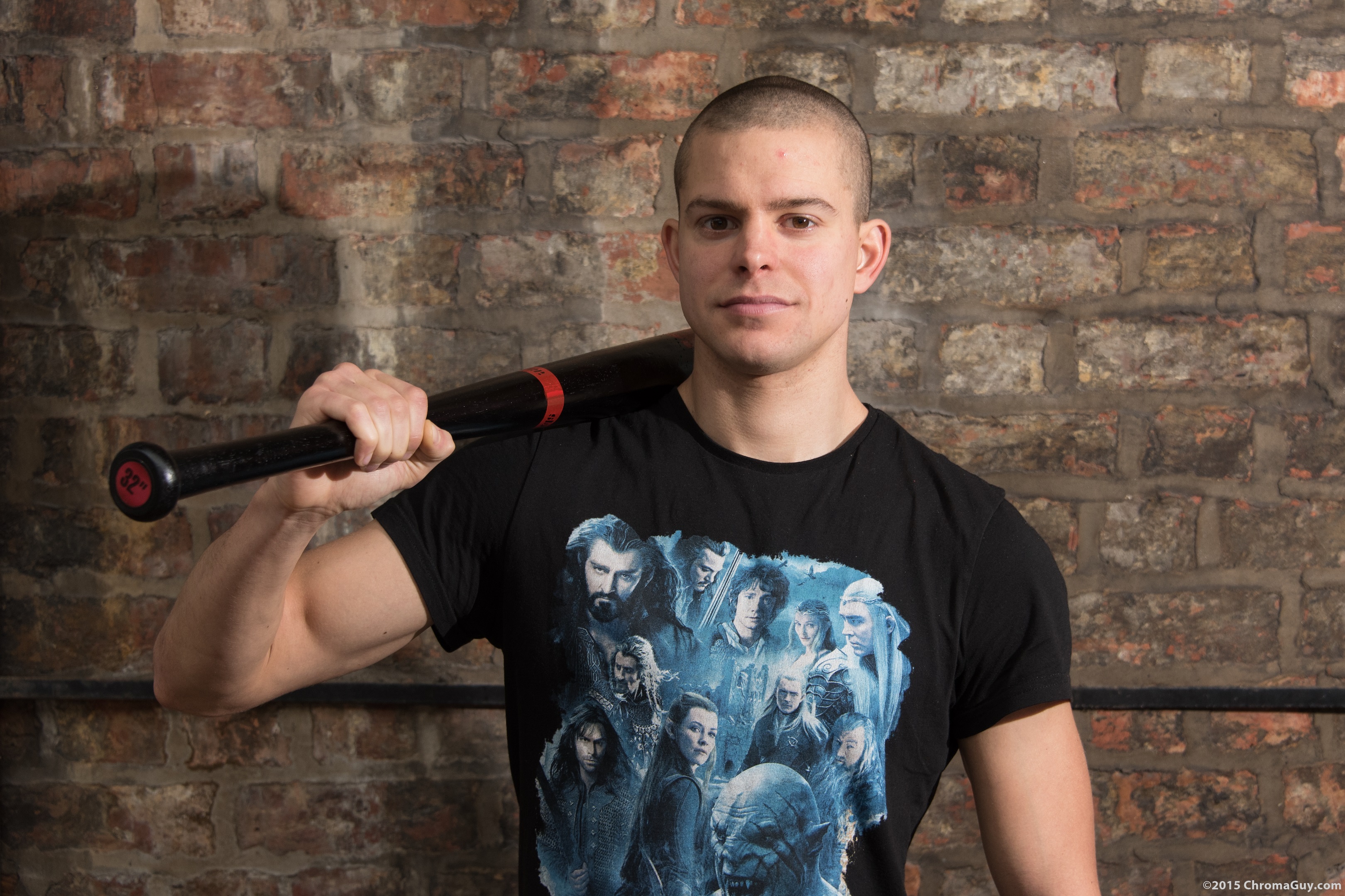 Guy with baseball bat on shoulder