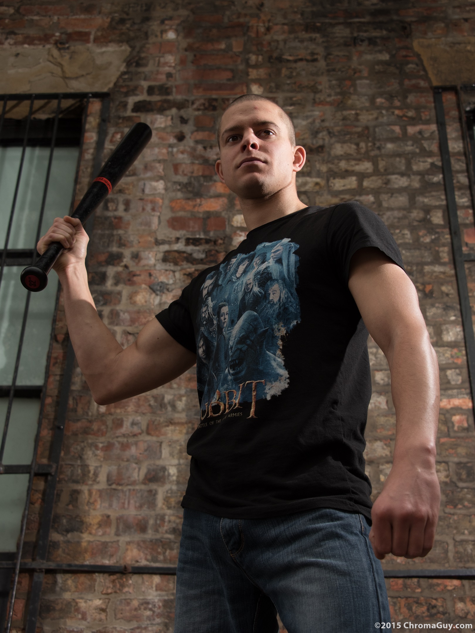 Guy wielding baseball bat