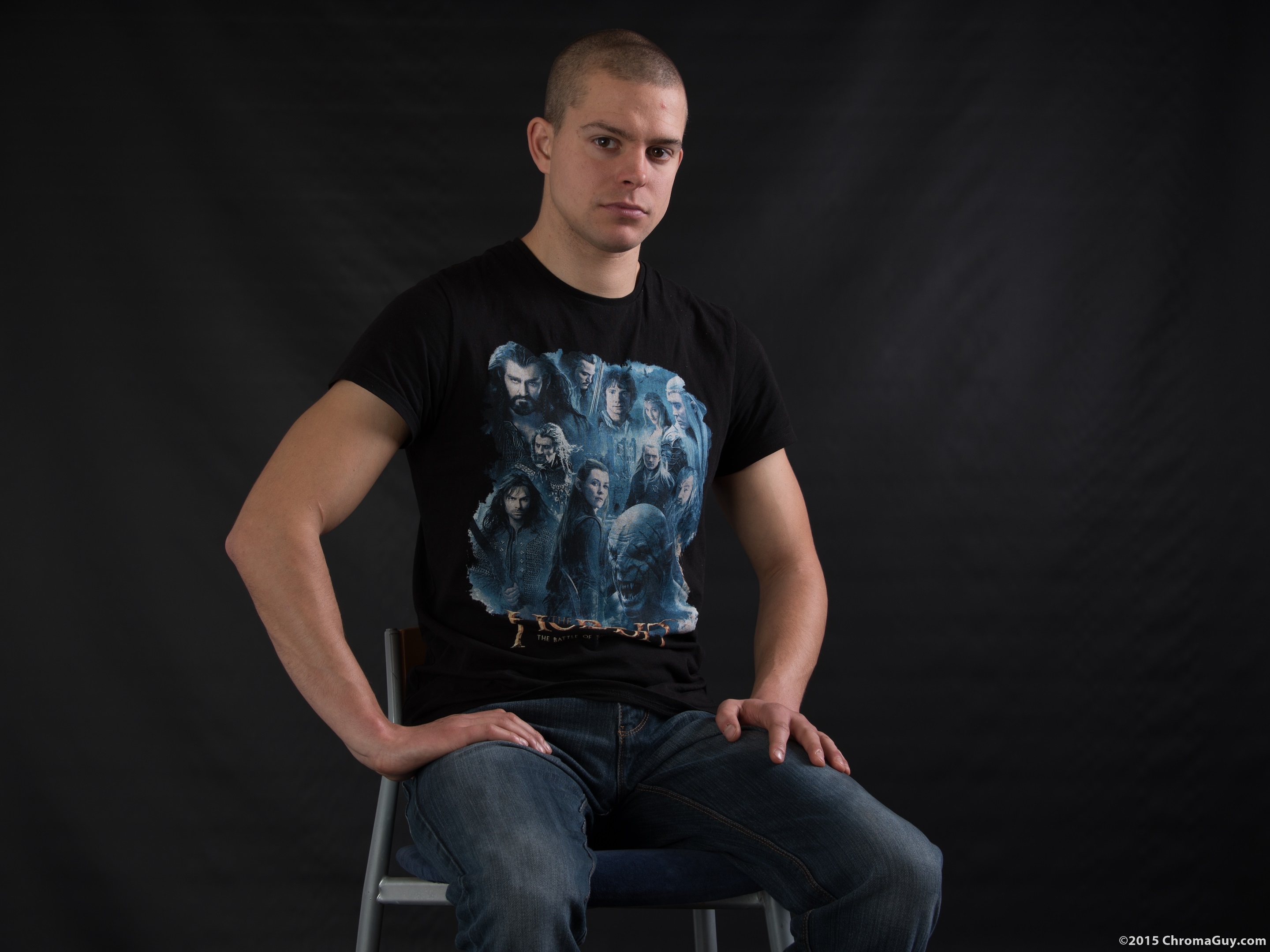 Guy sitting in jeans