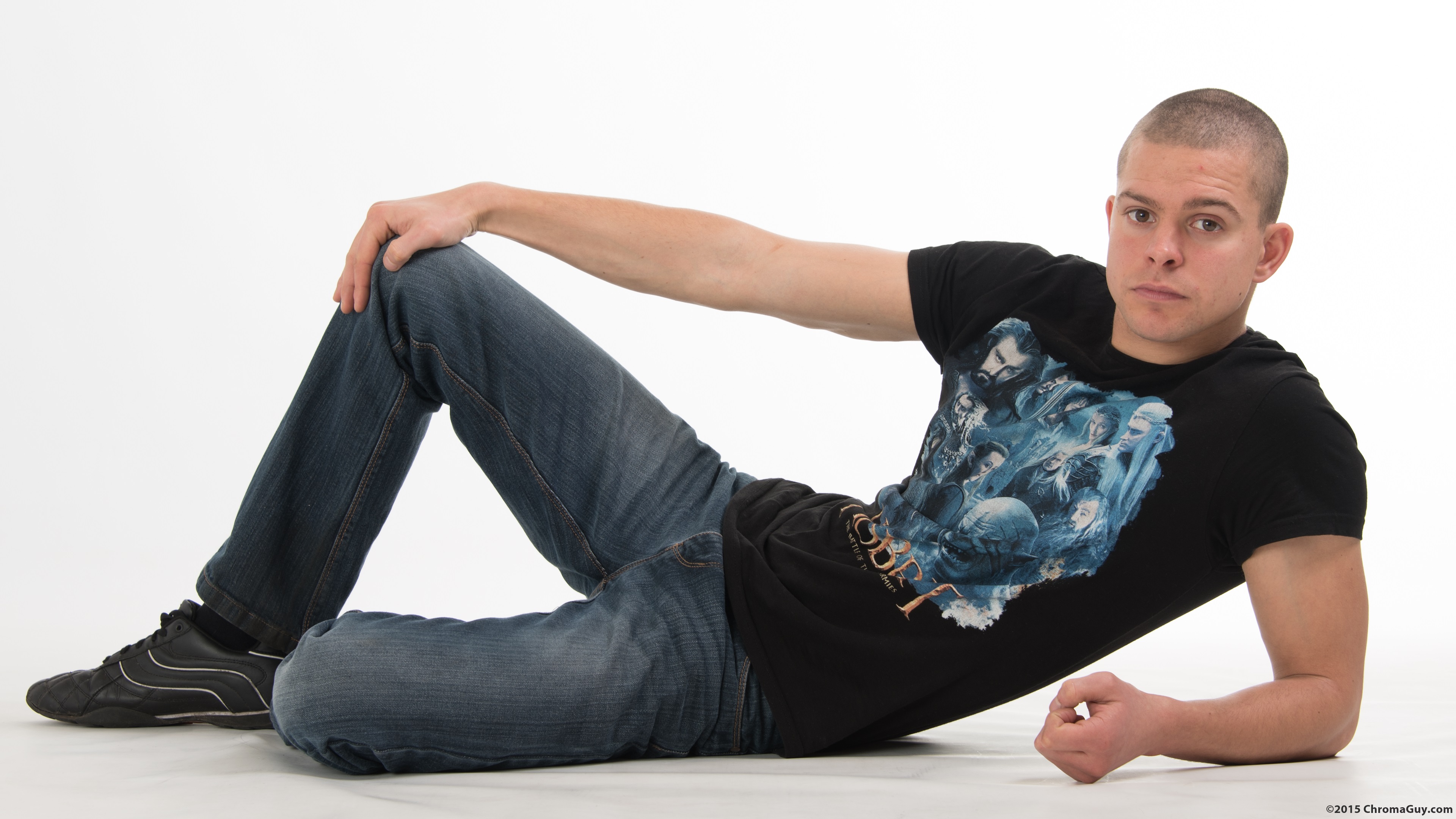 Guy lying on floor in jeans
