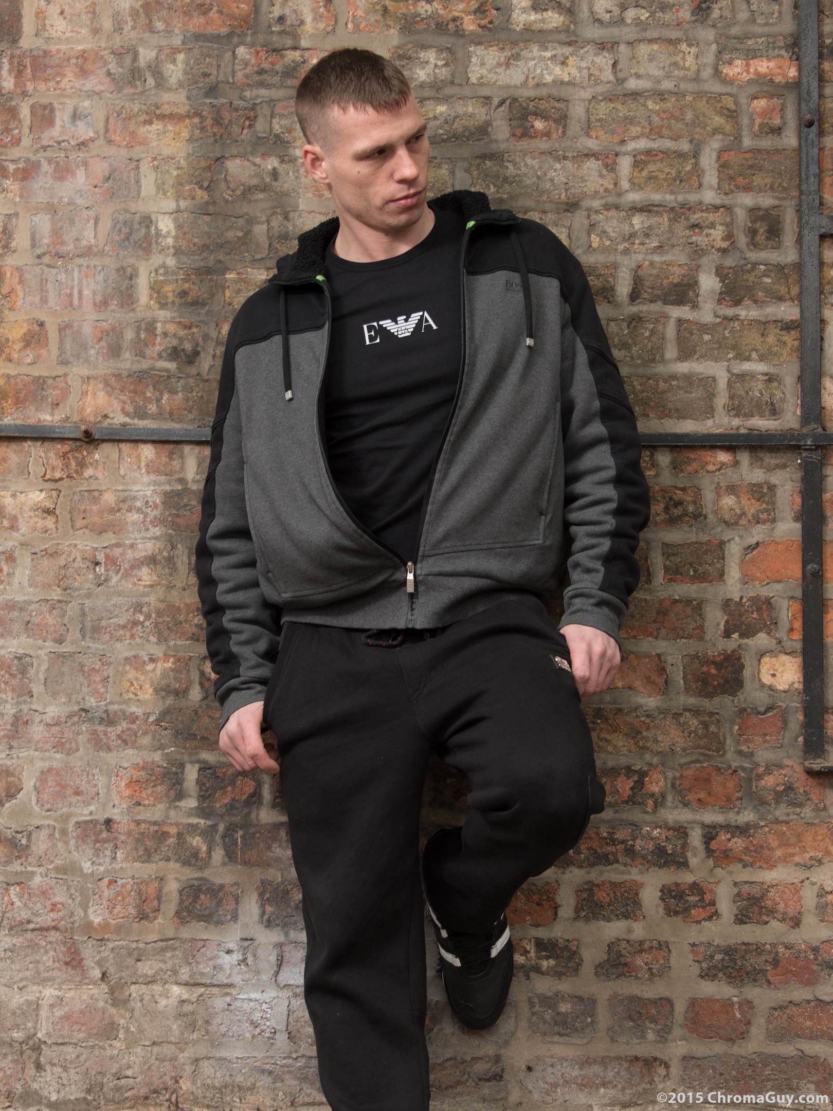 Guy leaning against wall