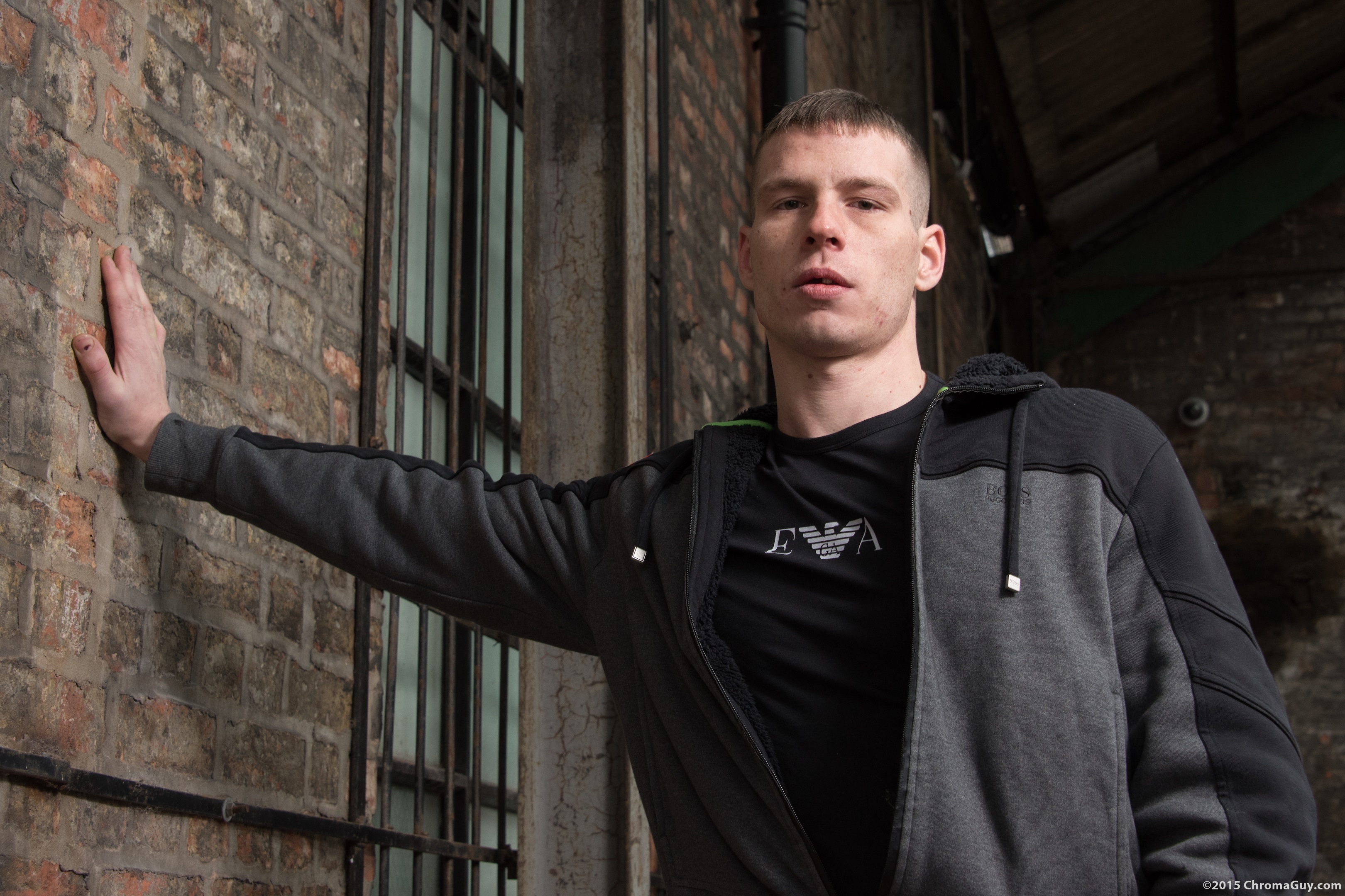 Leaning against a wall