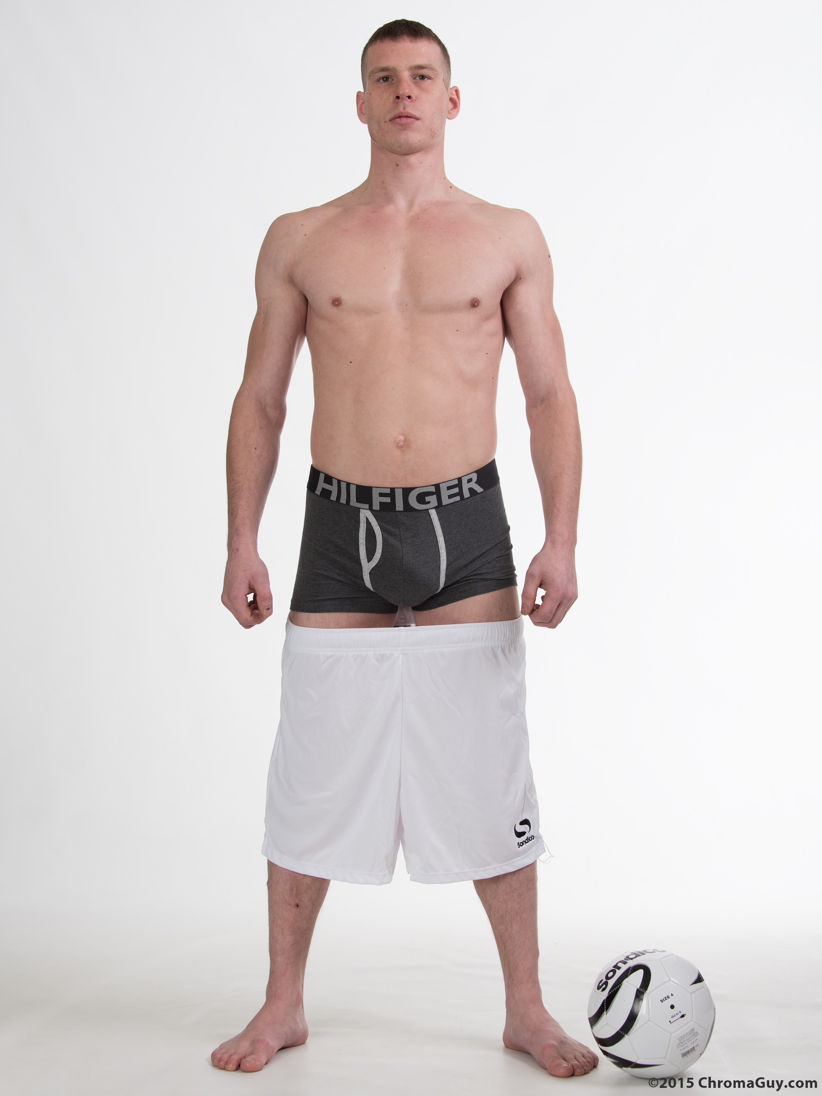 Guy taking shorts off