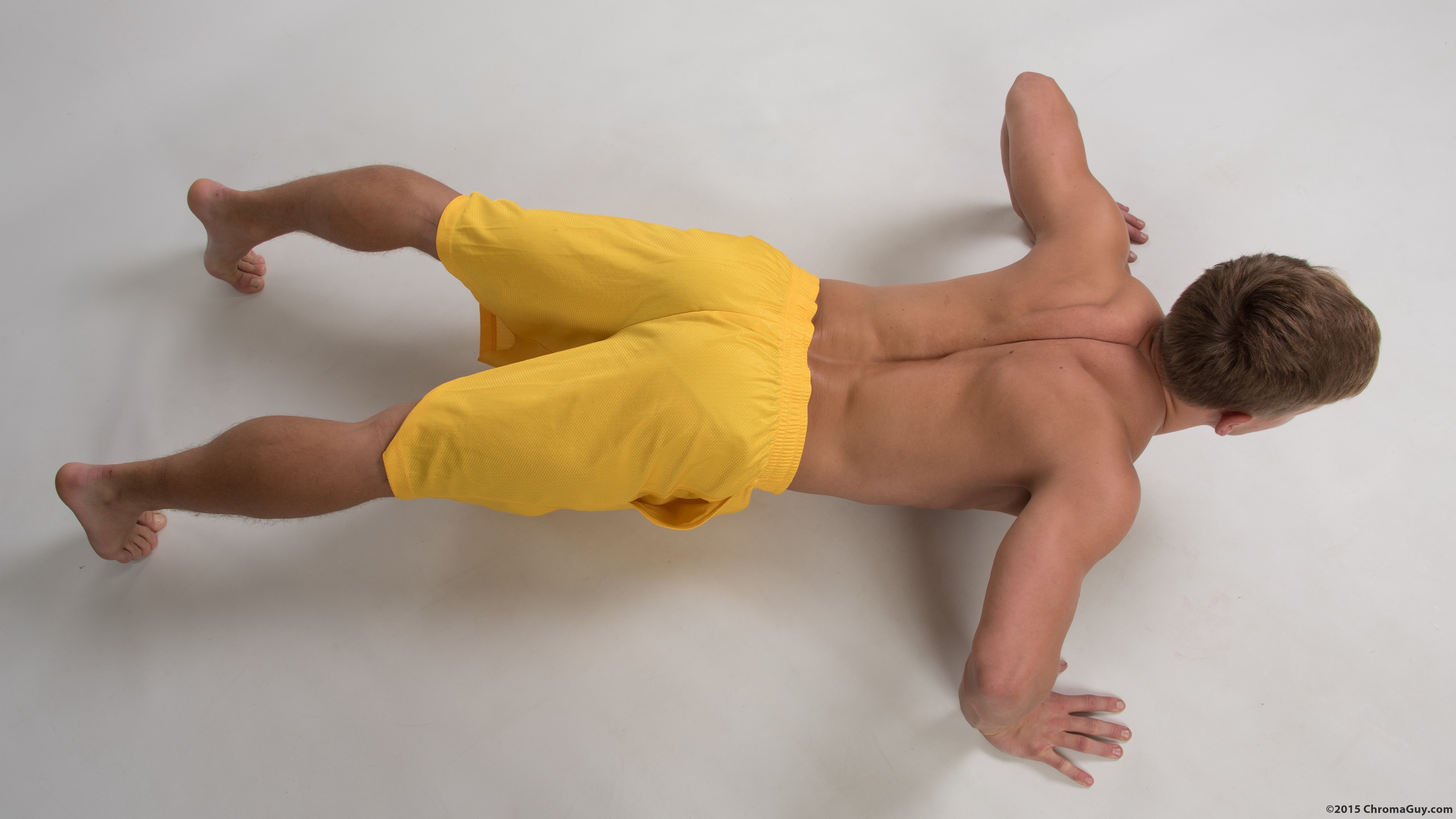 Topless guy doing pressups