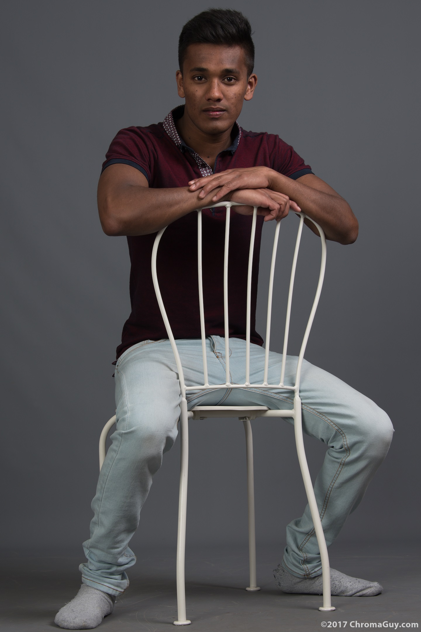 Guy sitting in jeans