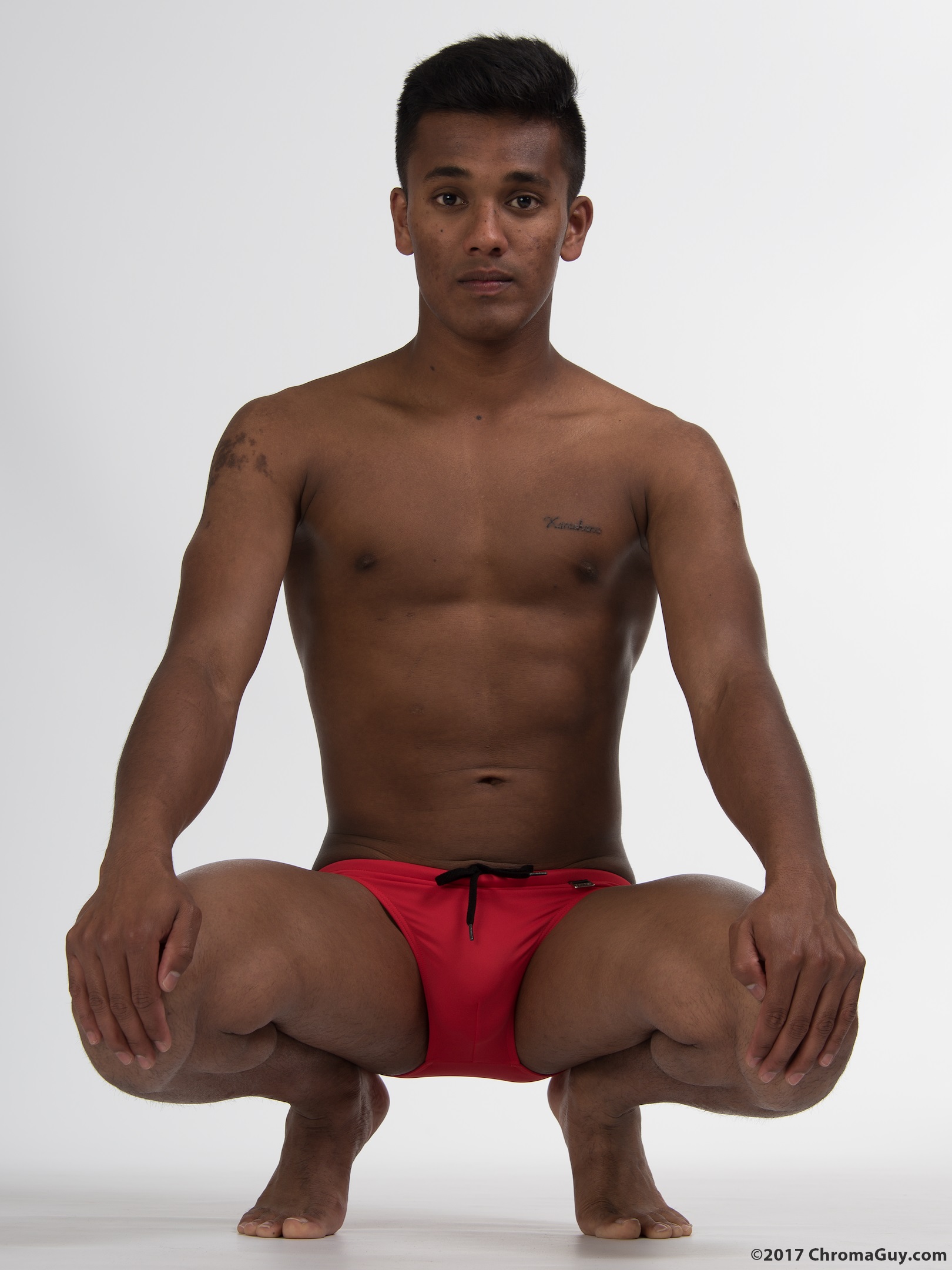 Squatting in speedos