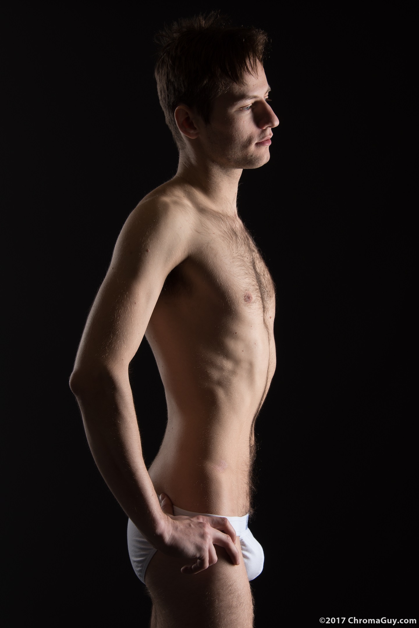 Guy wearing white tanga briefs